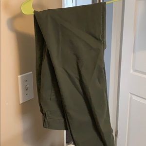 Green pants. No rips, worn a hand full of times.